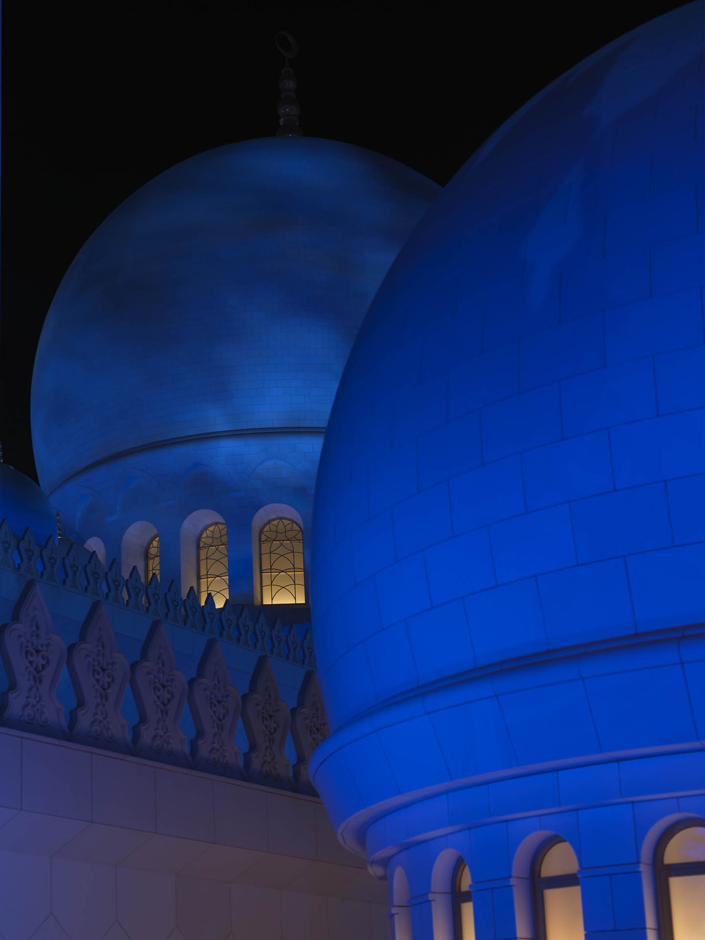 Sheikh Zayed Grand Mosque domes illuminated at night